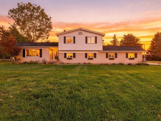 House for sale in Highland, Highland Township