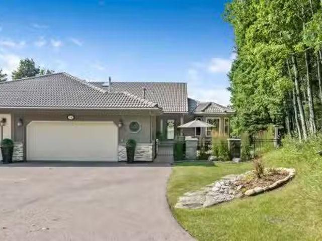 House for sale in Priddis Greens, Alberta