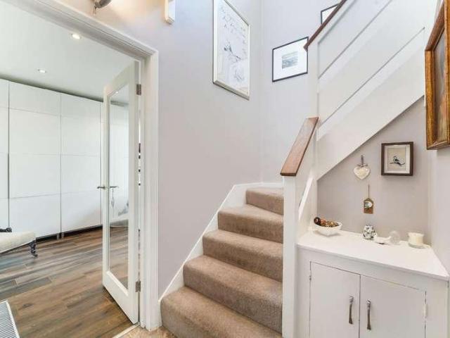 House for sale in Woodcote, Epsom