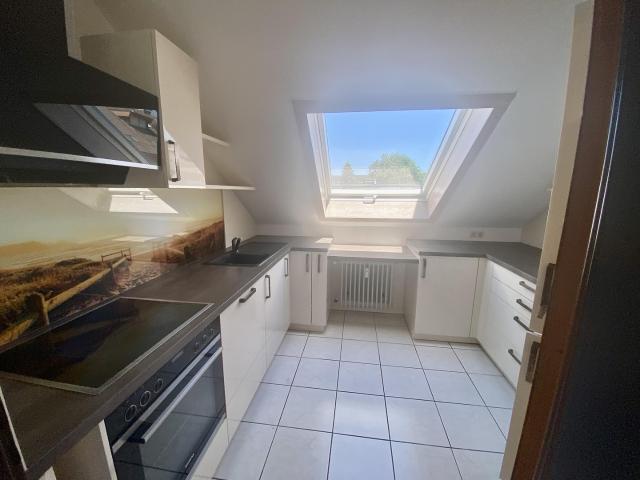 Dachgeschosswohnung kaufen in Teningen (Kernort), Teningen