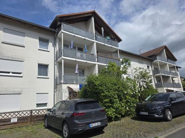 Dachgeschosswohnung kaufen in Arnstein, Bayern
