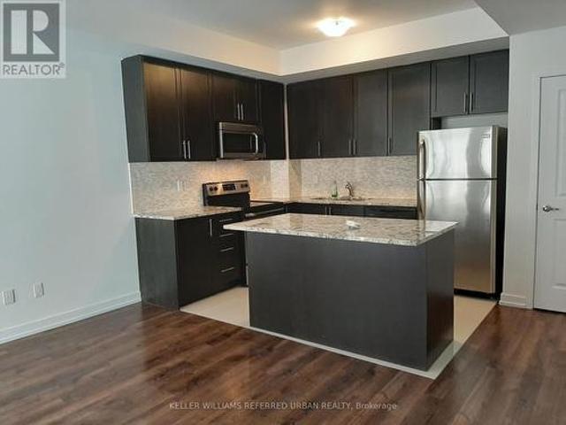 Townhouse for sale in Woburn, Ontario