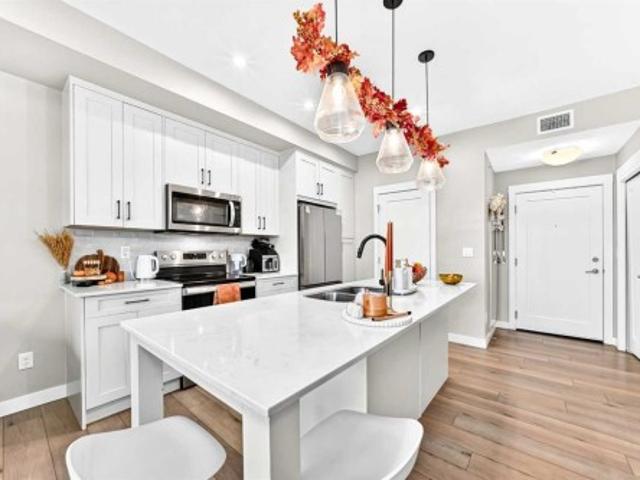 Condo for sale in Auburn Bay, Calgary