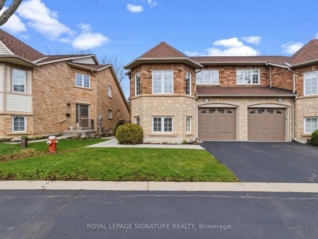 Condo for sale in Woburn, Ontario