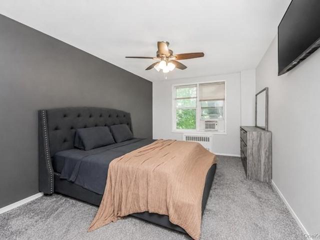 Townhouse for sale in Glenwood, New York