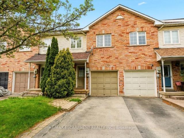 Townhouse for sale in Woburn, Ontario