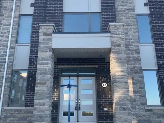 Townhouse for sale in Woburn, Ontario