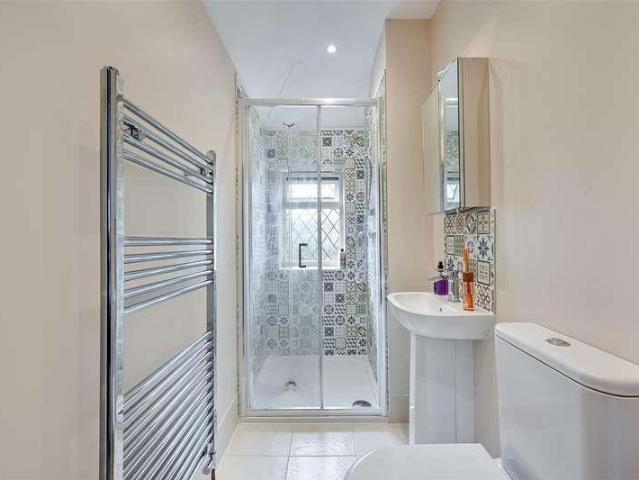 House for sale in Woodcote, Epsom