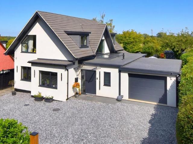 House for sale in Woodcote, Guildford