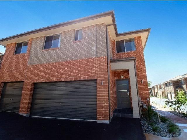Townhouse for rent in Woodcroft, Sydney