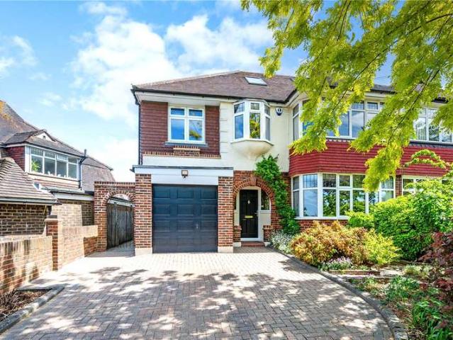 House for sale in Woodcote, Epsom