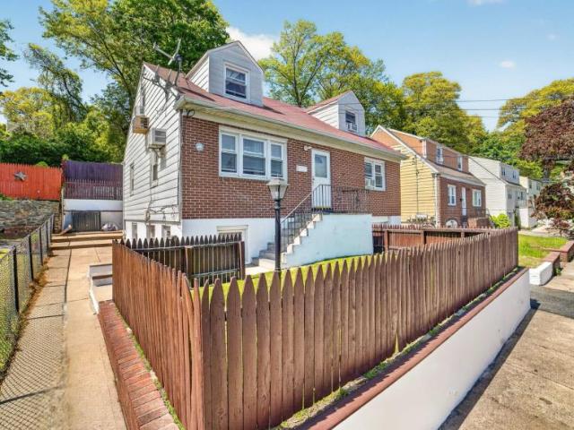 House for sale in Glenwood, New York