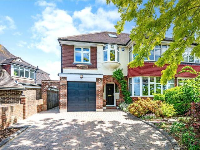 House for sale in Woodcote, Epsom