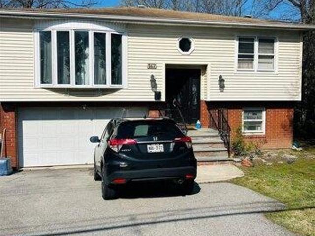 House for sale in Glenwood, New York