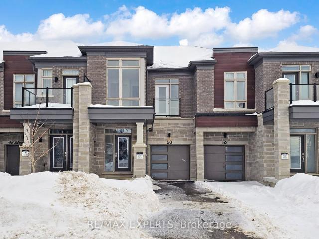 Townhouse for sale in Woburn, Ontario