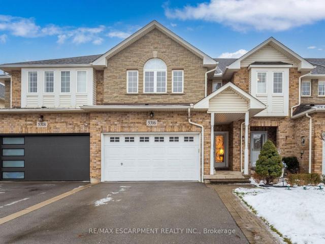 Townhouse for sale in Woburn, Ontario