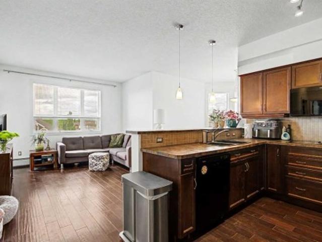 Condo for sale in Springbank Hill, Calgary