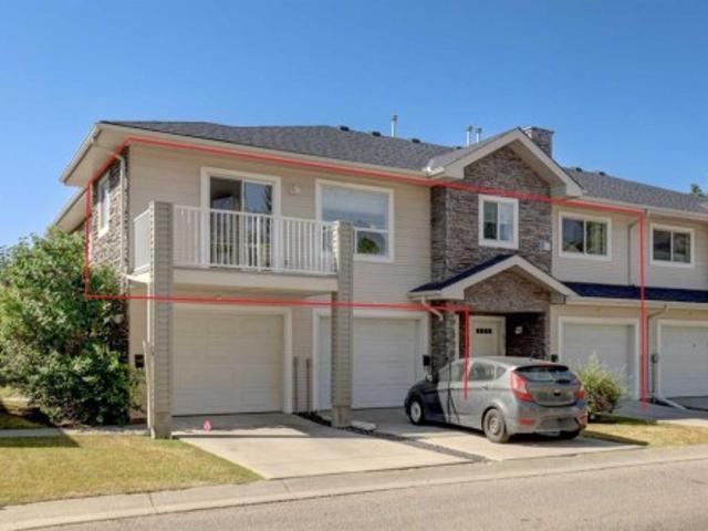 Townhouse for sale in Pineridge, Calgary