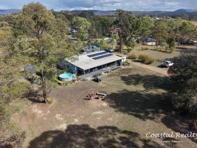 Cottage for sale in Coomba Park, New South Wales