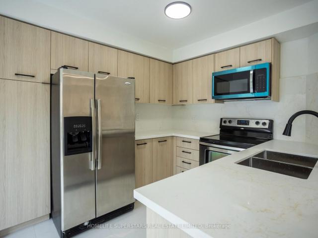 Townhouse for sale in Woburn, Ontario