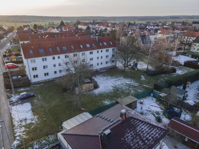 Erdgeschosswohnung kaufen in Thräna, Borna