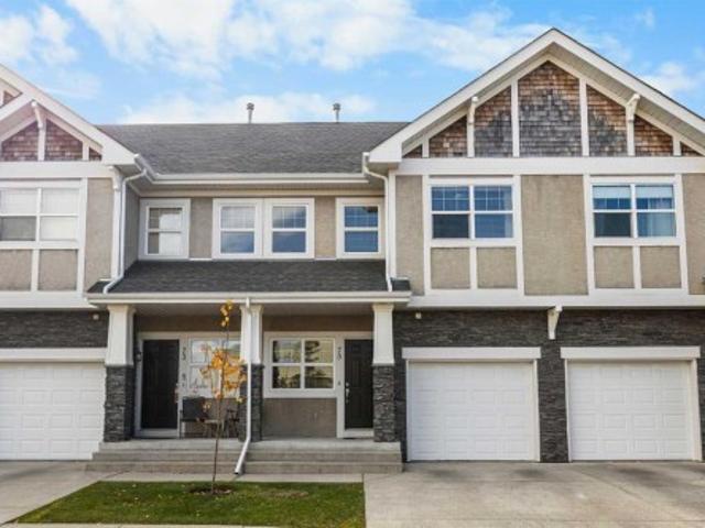 Townhouse for sale in Springside, Calgary