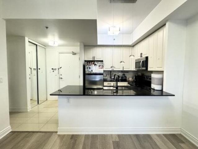 Condo for sale in Woburn, Ontario