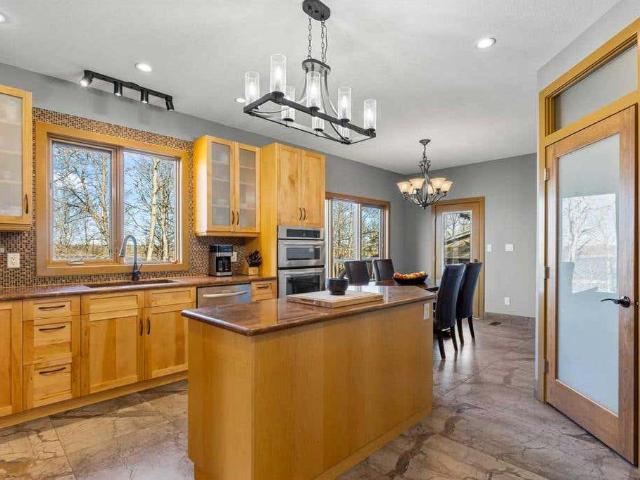 House for sale in Cochrane Lake, Alberta