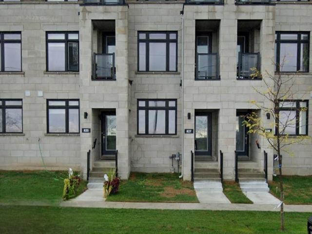 Townhouse for sale in Woburn, Ontario