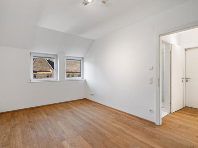 Dachgeschosswohnung kaufen in Wien