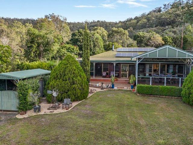 Cottage for sale in Withcott, Queensland