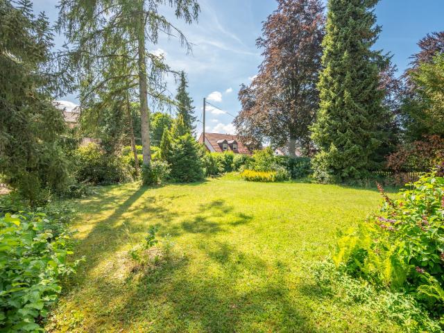 Erdgeschosswohnung kaufen in Grasbrunn, Bayern