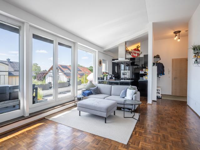 Dachgeschosswohnung kaufen in Moosach, München