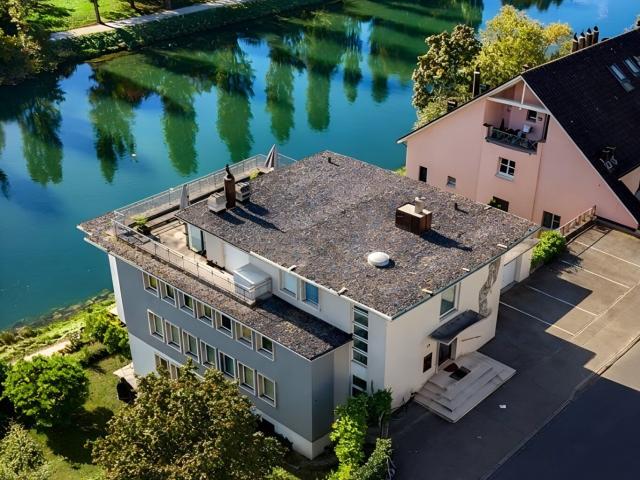 Apartment kaufen in Einigen, Zürich
