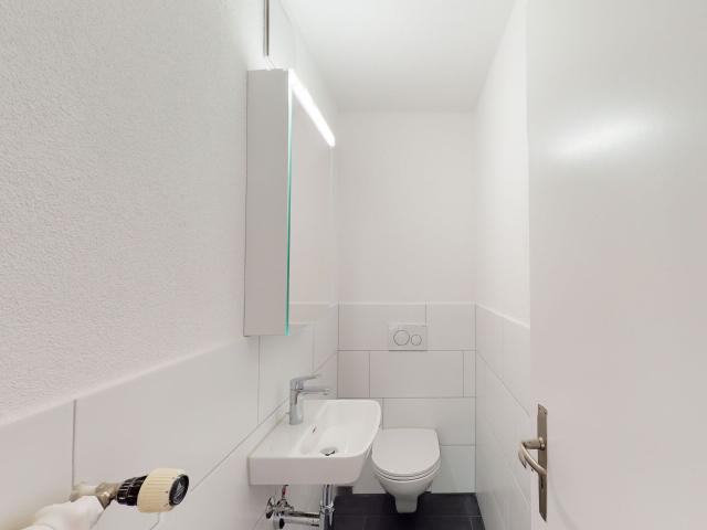 Apartment kaufen in Einigen, Zürich