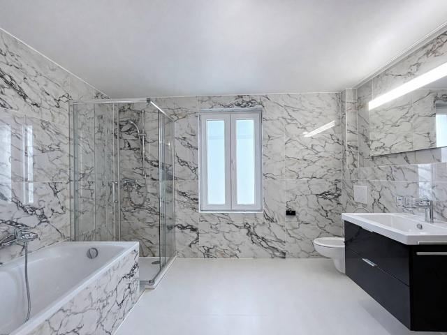 Apartment kaufen in Jouxtens-Mézery, Waadt
