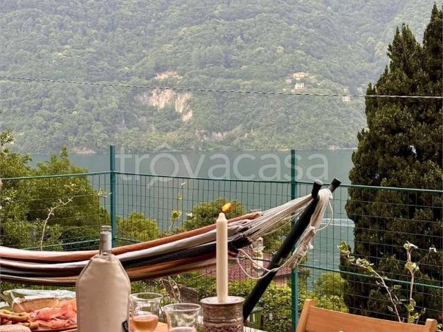 Appartamento in affitto a Laglio, Lombardia