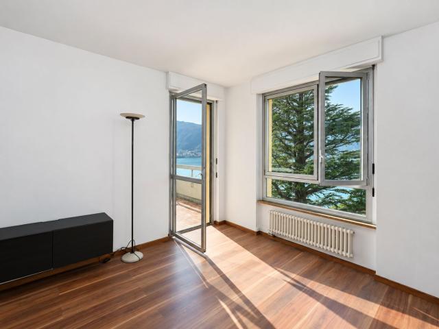 Attikawohnung kaufen in Bissone, Tessin