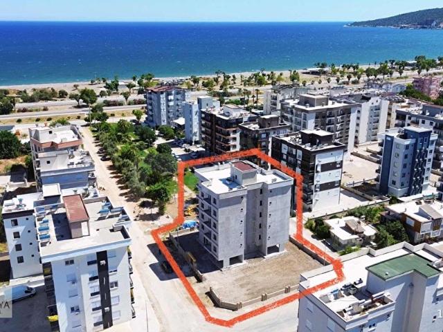 Kum, Finike içerisinde satılık mülk