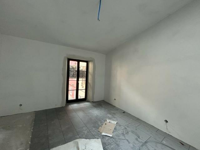 Wohnung kaufen in Bissone, Tessin