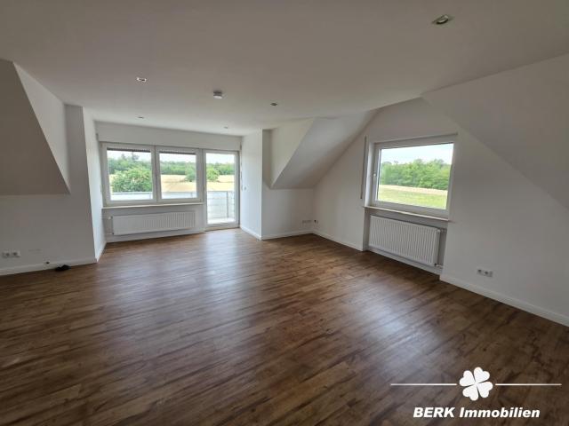 Dachgeschosswohnung kaufen in Zellhausen, Hessen