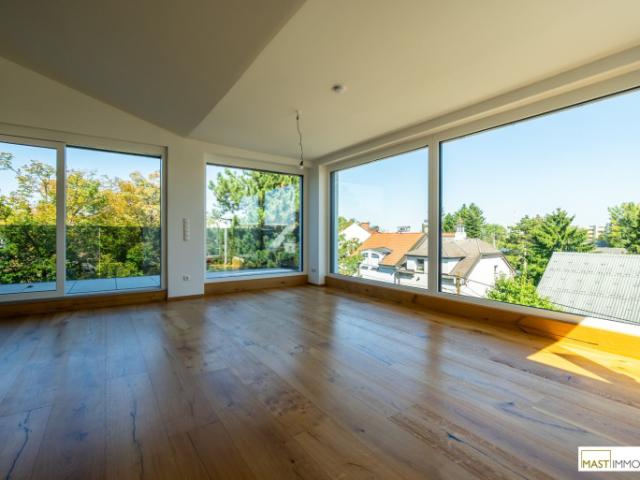 Dachgeschosswohnung kaufen in Simmering, Wien