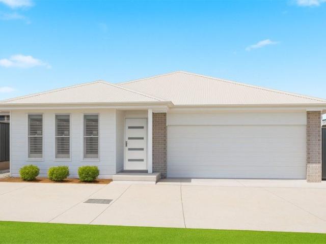 Cottage for sale in Lake Cathie, New South Wales