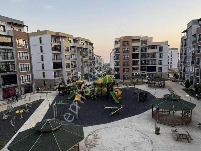 Buruk, Sariçam içerisinde satılık mülk