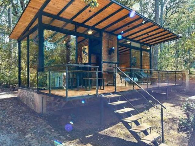 Cabaña en venta en Tapalpa. En el interior del bosque