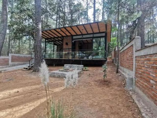Cabaña en venta en Tapalpa. En el interior del bosque