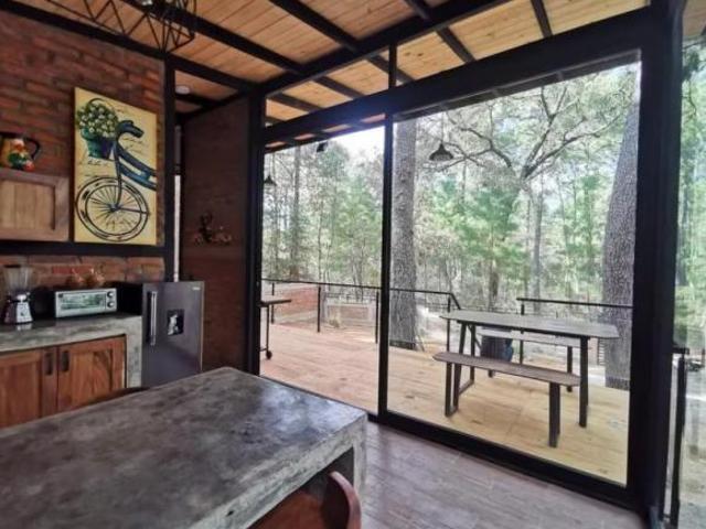 Cabaña en venta en Tapalpa. En el interior del bosque