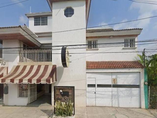 CASA EN NOGAL EN POZA RICA CON UN LOCAL COMERCIAL EN VENTA HIPOTECARIA