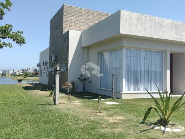 Casa venda em Condomínio Riviera 1, Xangri-lá