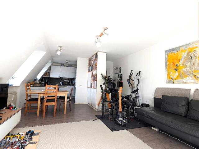 Dachgeschosswohnung kaufen in Pasing-Obermenzing, München